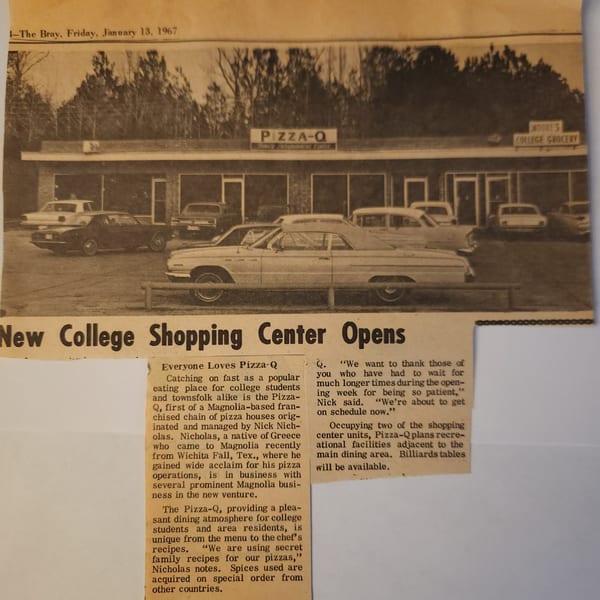 Vintage black and white photo of Pete's Pizza restaurant exterior with cars parked outside.