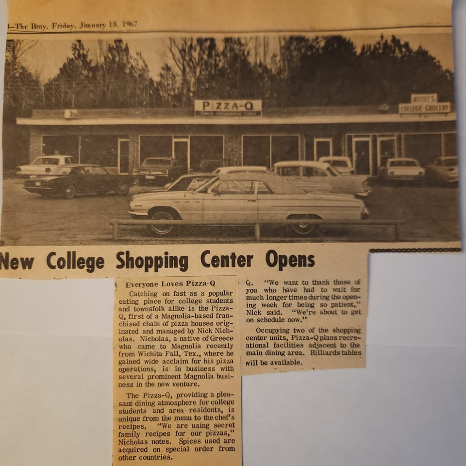 Vintage black and white photo of Pete's Pizza restaurant exterior with cars parked outside.