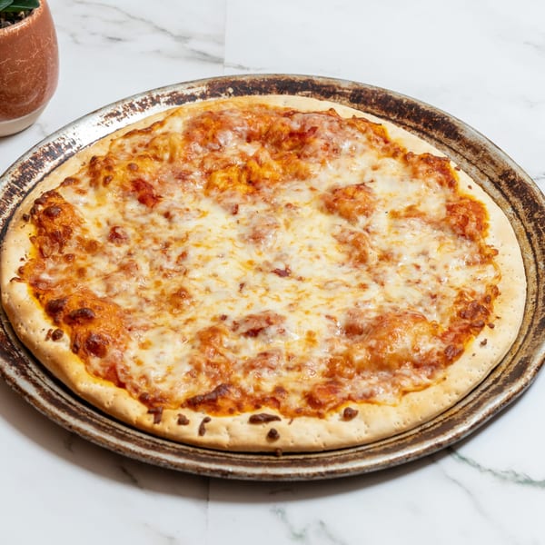 A freshly baked cheese pizza from Pete's Pizza, golden brown and bubbling on a metal pan.